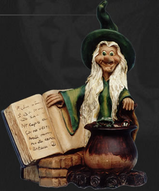 Witch with cauldron preparing magic potion